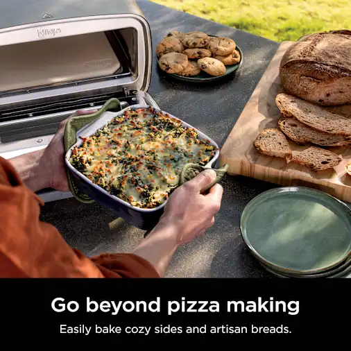 1021-ninja-artisan-5-in-1-electric-pizza-oven-kit-with-peel-adjustable-table-amp-cover-1.webp